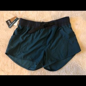 **never worn*** Blue Nani/REI athletic swim shorts with cute buckle detail